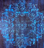 Blue floral pattern on a dark fabric background
