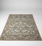 Decorative rug with floral and bird pattern on a plain background
