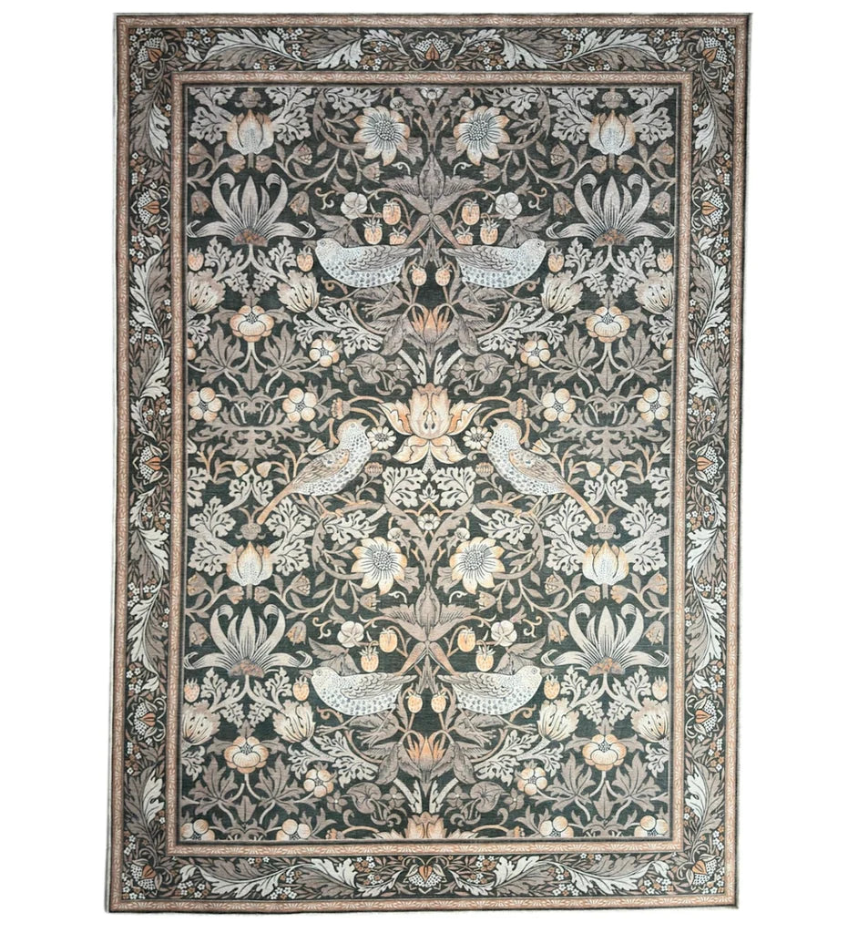 Decorative rug with floral and bird pattern on a white background