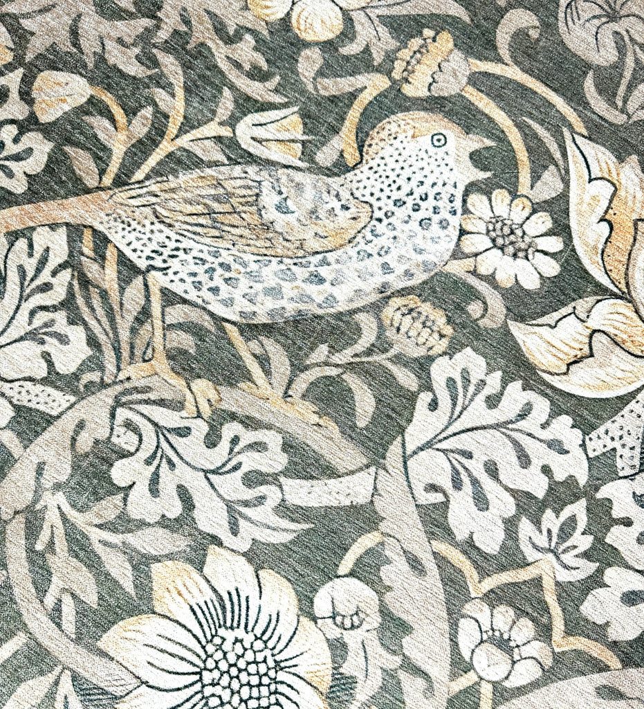 Decorative fabric pattern with birds and flowers on a dark background