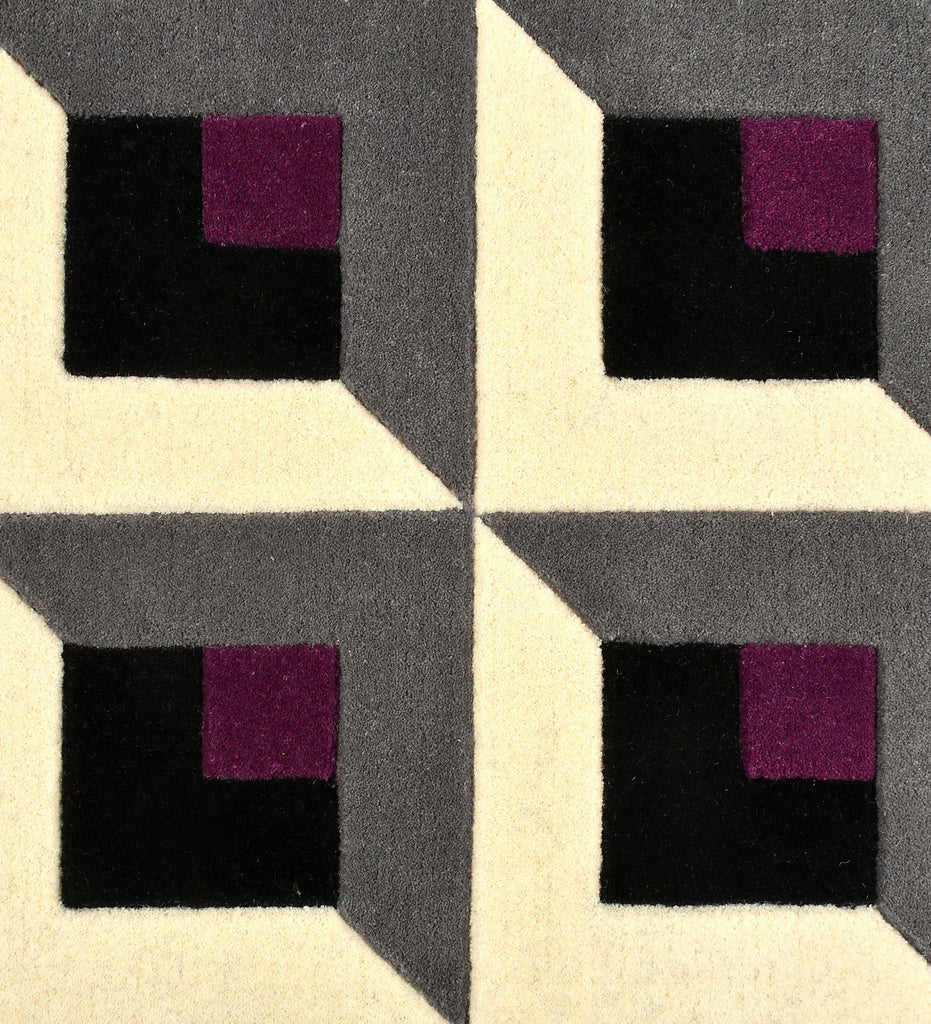 Geometric pattern with squares in black, purple, and gray on a textured surface.