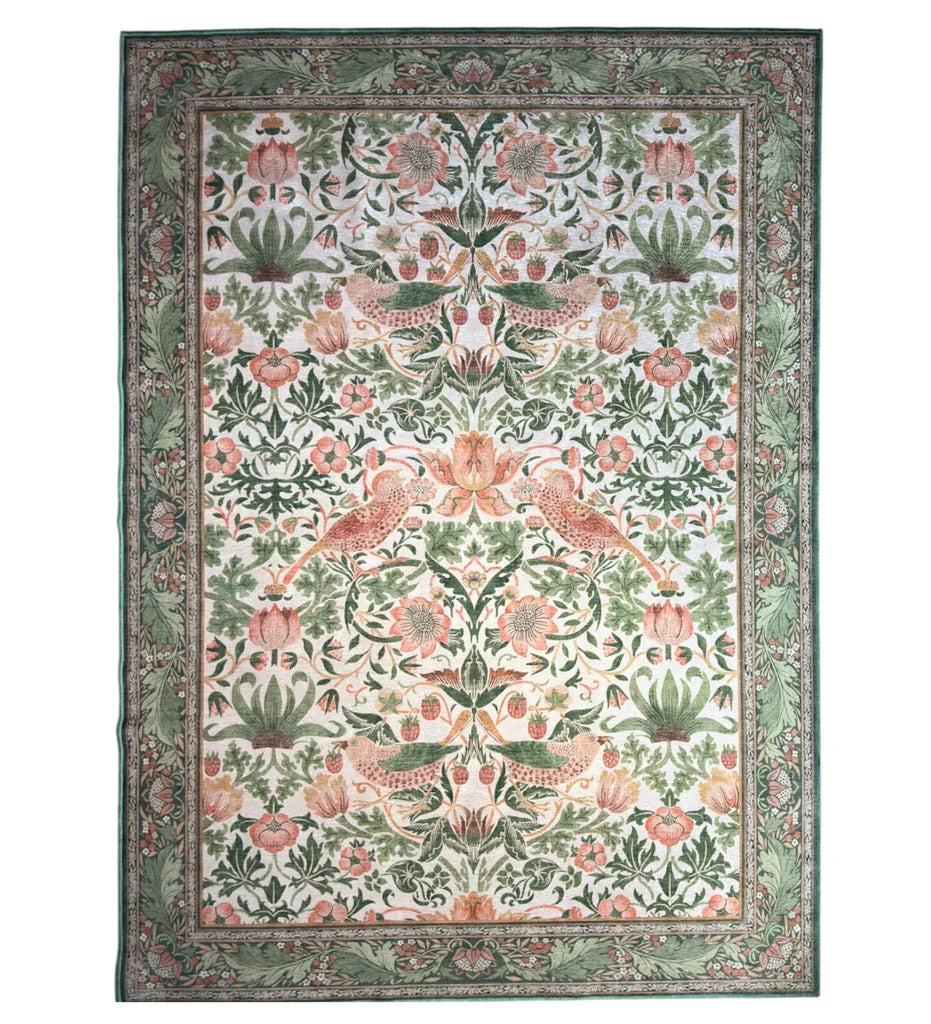 Decorative rug with floral and bird pattern on a white background