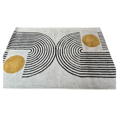 cream and gold area rug