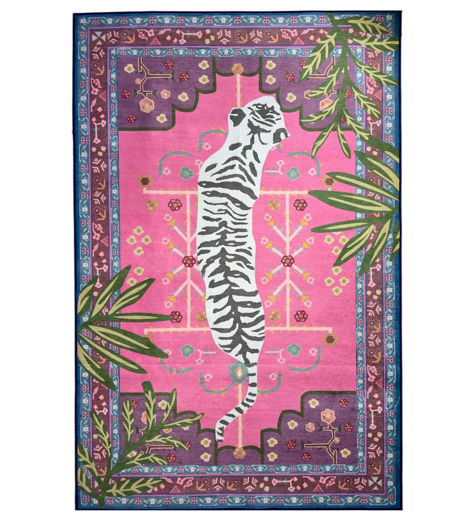 Decorative rug with a zebra design on a pink background