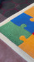 Showcase of our multicolor puzzle piece rug