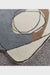 luxury abstract hand-tufted wool rug, designed with free-form organic shapes in soothing tones of charcoal grey, warm brown, ivory, and beige.