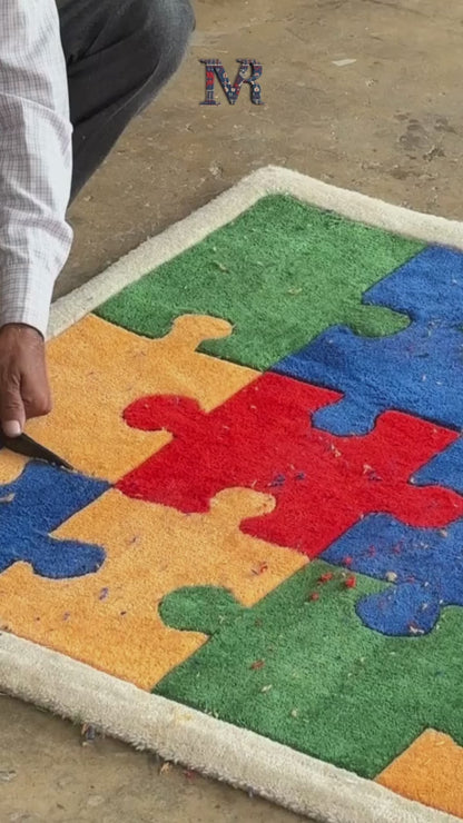 Colorful hand tufted puzzle piece rug finishing process with the artisan