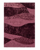 Purple abstract patterned rug on a white background